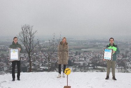 3 Menschen auf einem Berg